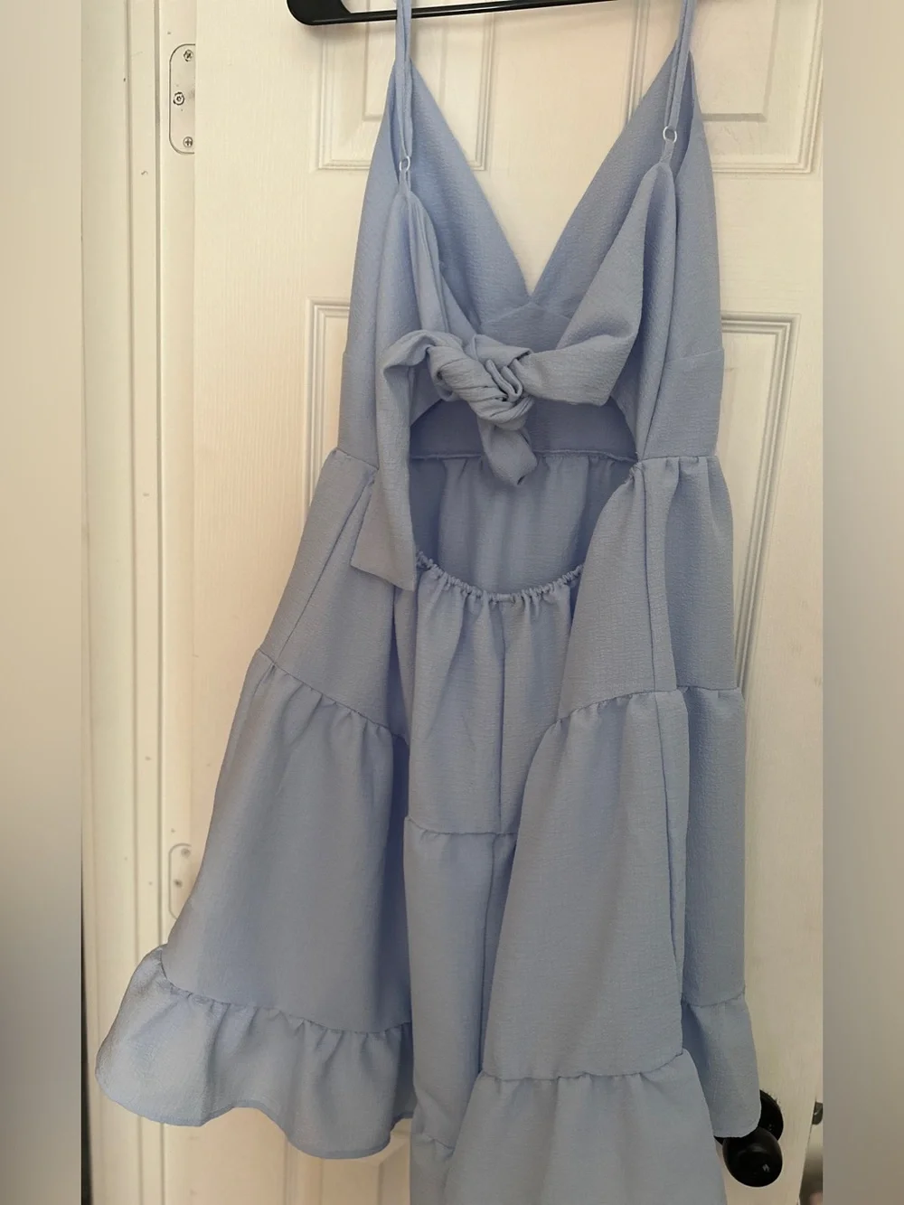 Dusty blue ruffle dress with bow tie in back